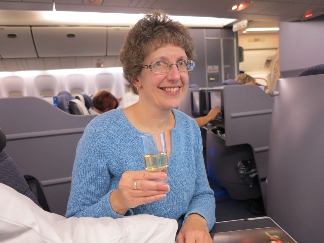 2.1412981121.sue-with-her-wine-in-1st-class